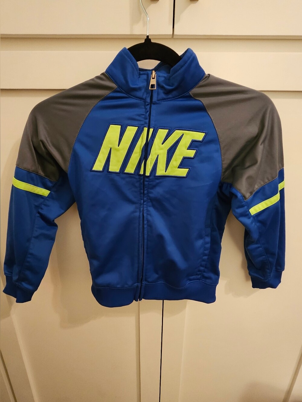 Nike Royal Blue Jacket with Neon Yellow Logo. Boys Size 7  Back To School